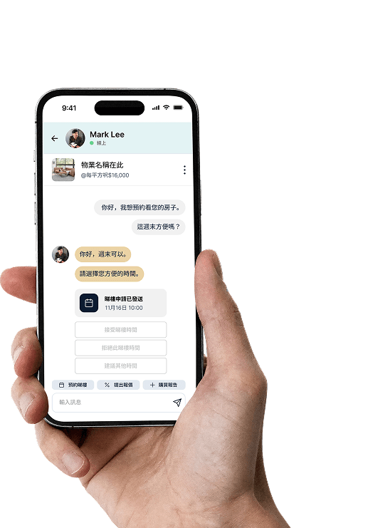 Hand holding mobile phone with real estate app